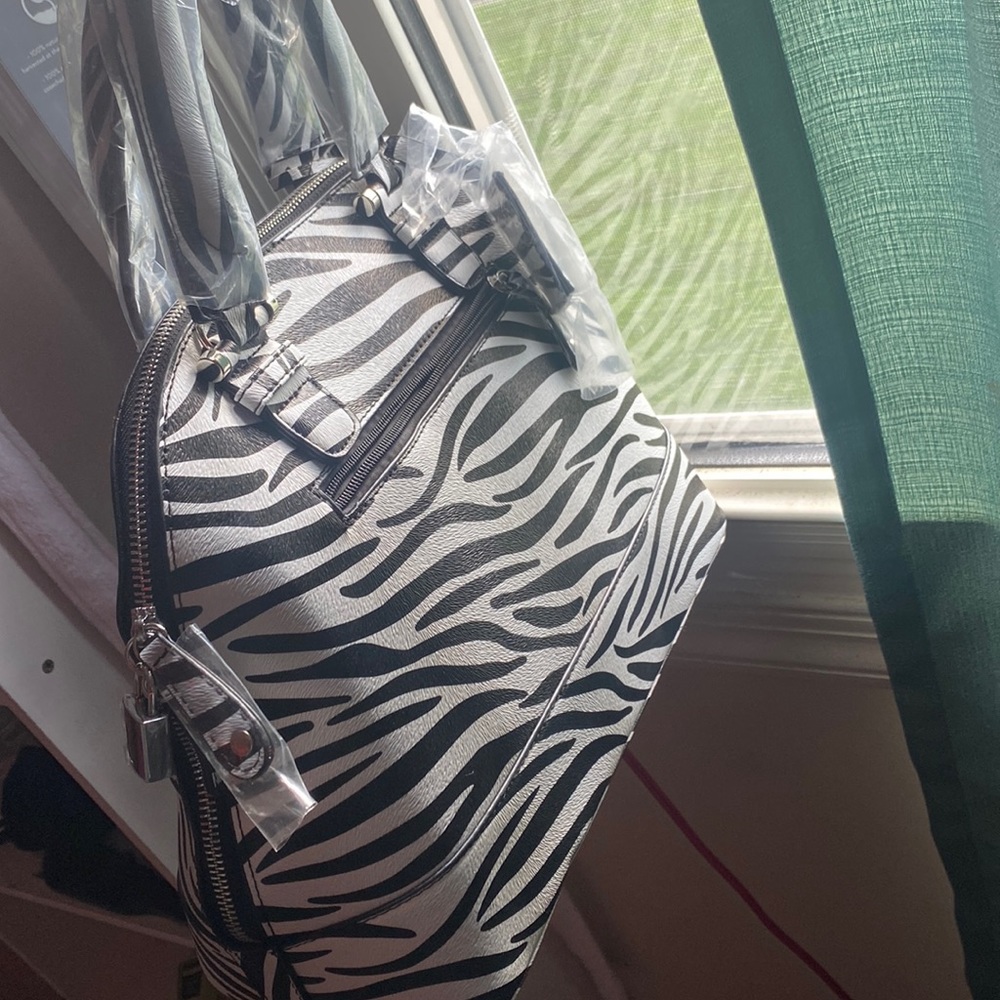 Zebra print medium sized cross body hand bag purse (JUSTFAB)